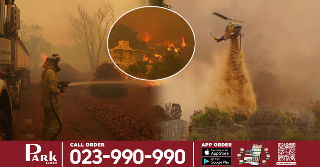 ភ្លើងឆេះព្រៃយ៉ាងសន្ធោ​សន្ធៅបានវាយលុកទីក្រុងដ៏ធំមួយរបស់អូស្ត្រាលី ដែលធ្វើឱ្យផ្ទះចំនួន ៧១ ខ្នងត្រូវបានបំផ្លាញ ហើយអ្នកពន្លត់អគ្គិភ័យ ៦ នាក់បានរងរបួស