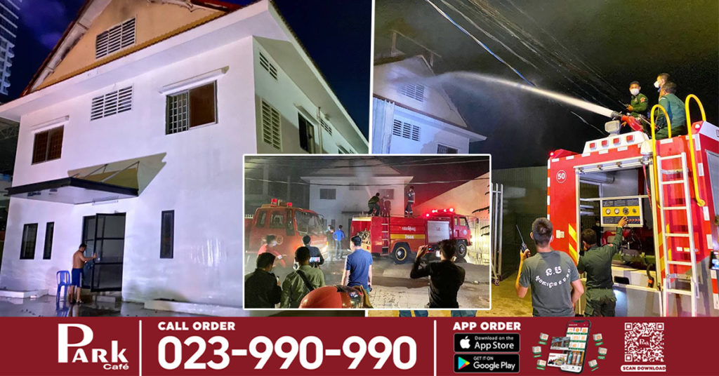 រថយន្តពន្លត់អគ្គិភ័យមួយគ្រឿង គប់ប៉េរ ម៉ាស៊ីនពេលកំពុងត្រៀមបាញ់ទឹកពន្លត់អគារឆាប់ឆេះមួយកន្លែង